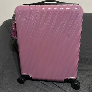 TUMI continental expandable 4 wheeled carry on - purple/pink - new with tags